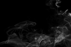 عکس با کیفیت دود و حرارت با زمینه تیره